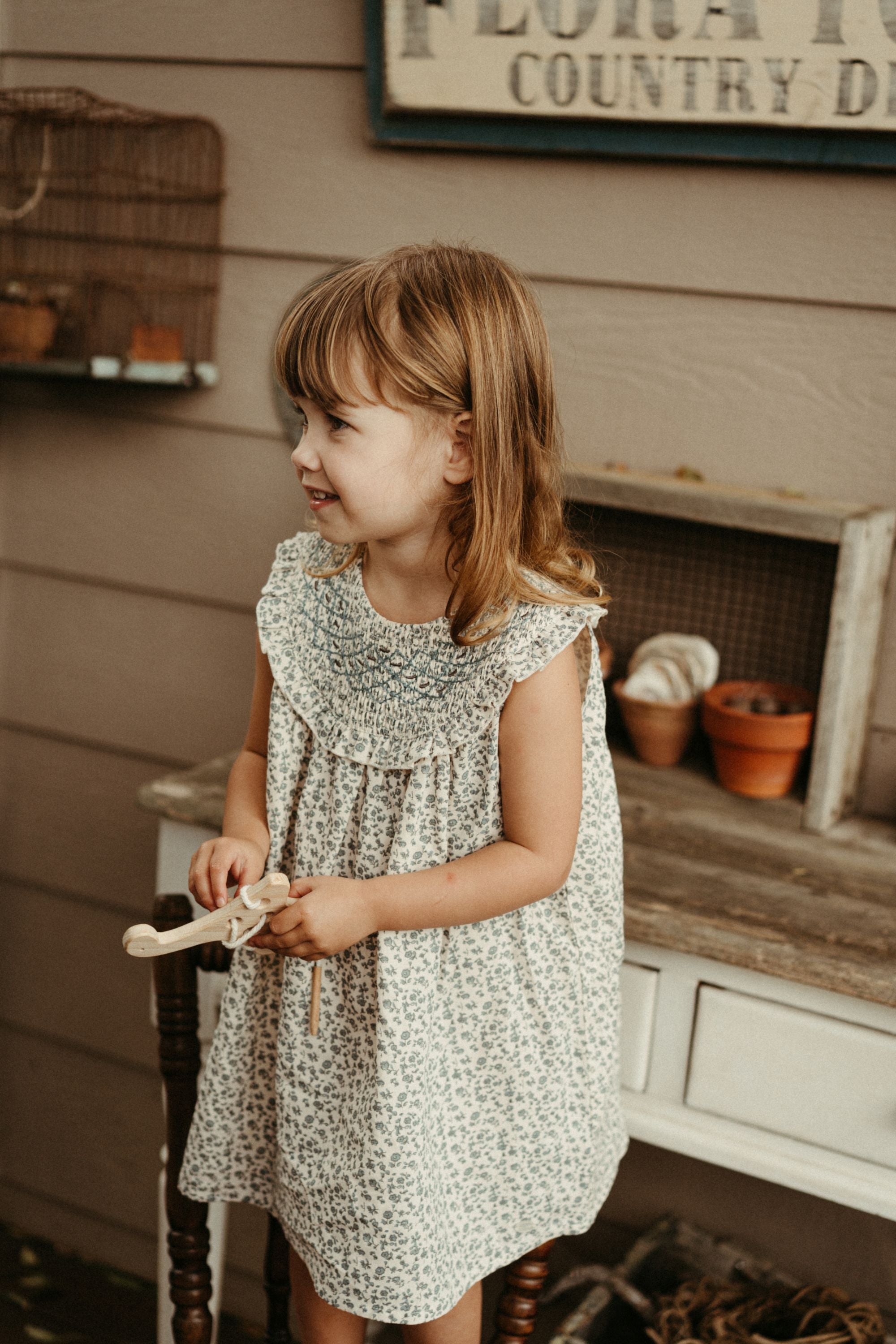 newborn smock dress Sweetly Smocked Greeting Gown, Worth Avenue White with Palmetto Pearl the White Smocked Rose Dress is designed with delicate handsmocking and embroidered rose motifs across the bodice Smocked Welcome Home Gown